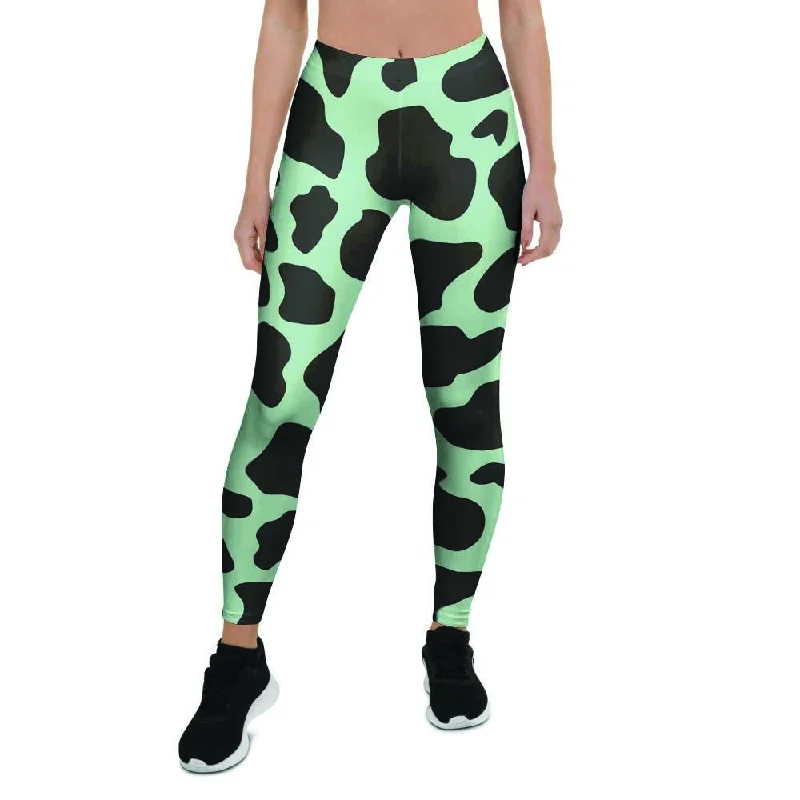Online Only Black And Green Cow Print Women's Leggings